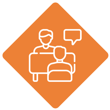 Two people talking at a table icon.